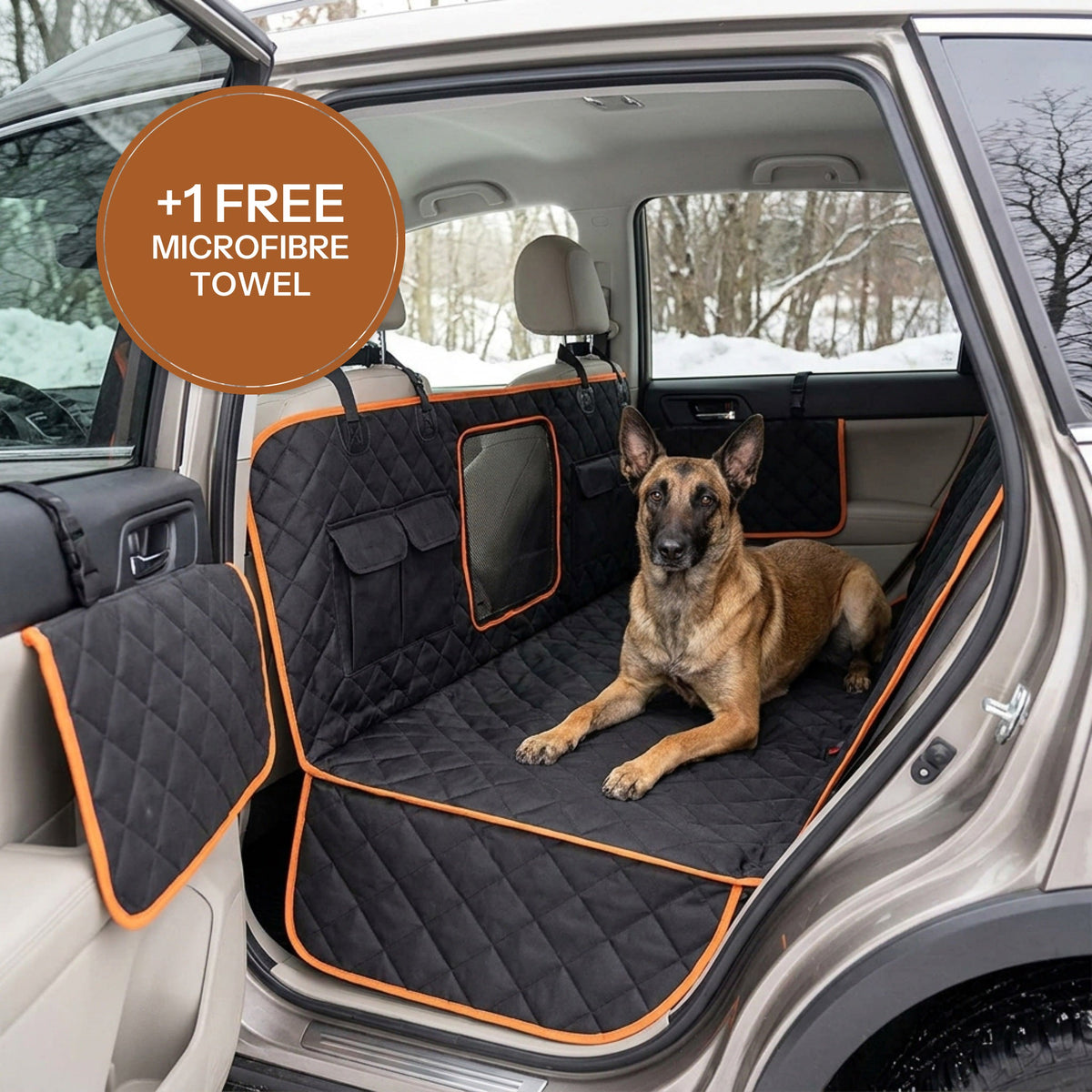 Belgian Malinois on a black quilted hammock seat cover with orange trim in a snowy SUV. A badge reads: plus one free microfibre towel.